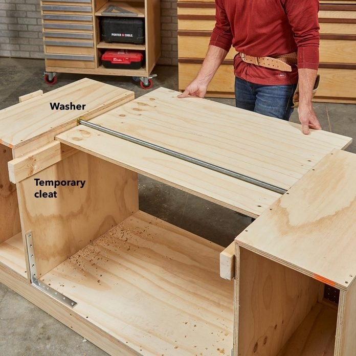 Workbench DIY Assembly with Pivoting Mechanism and Metal Rod Pivot