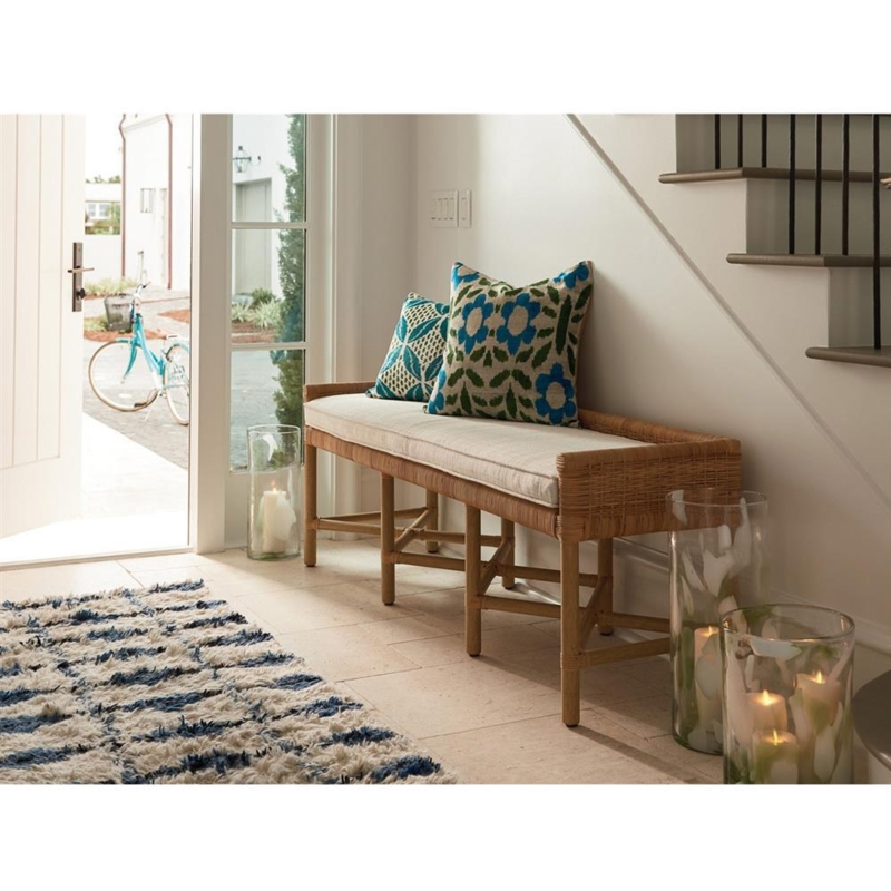 Woven Rattan Bench with Blue Pillows for Beach House Foyer