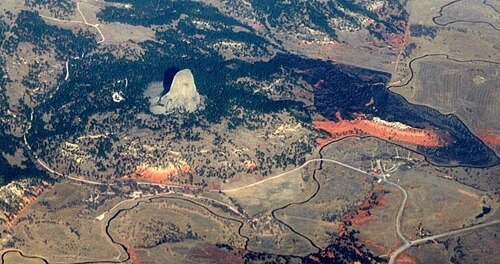 Aerial View of Fluted Rock Tower over Rust Base