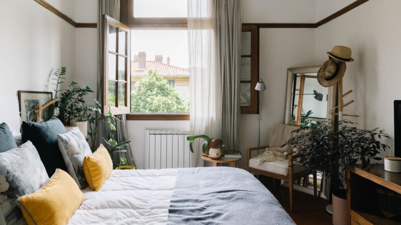 Bed Separate Duvets, Upholstered Headboard. Scandinavian Sleep Method Setup.