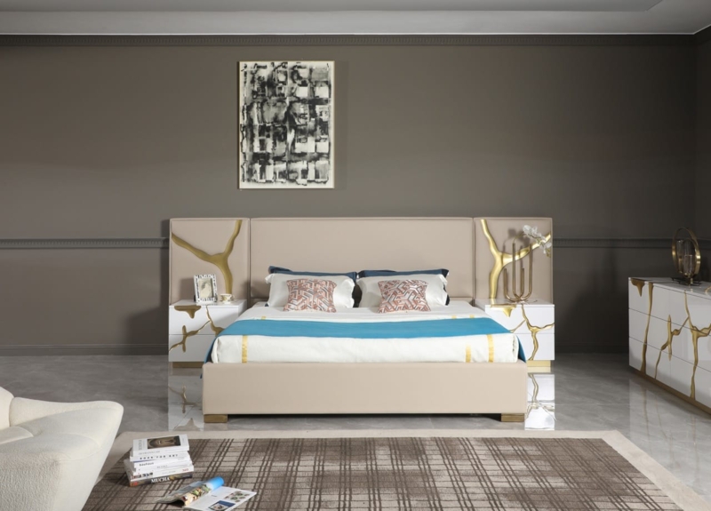 Beige Bed With Tall Paneled Headboard And Gold Metal Inlays