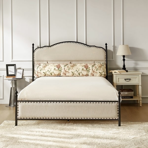 Black Metal Canopy Bed with High Grey Tufted Headboard and Bolster