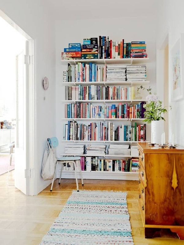 Built In Shelving White Floor To Ceiling With Integrated Radiator Cutout