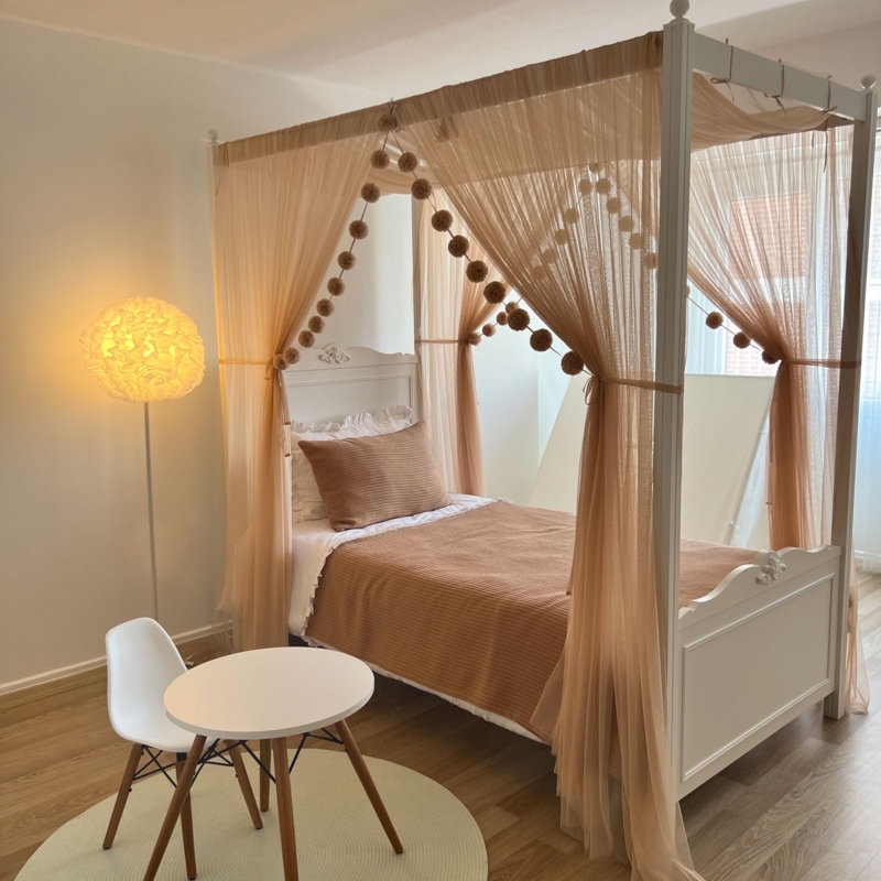 Champagne Canopy Bed with Sheer Drapes and Minimalist Square Metal Frame