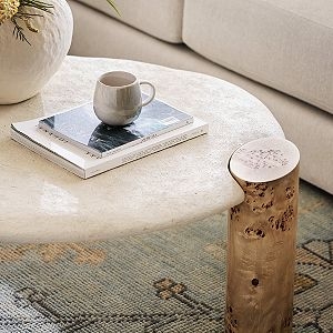 Coffee Table Round Faceted Base Cream Stone Like Texture Modern
