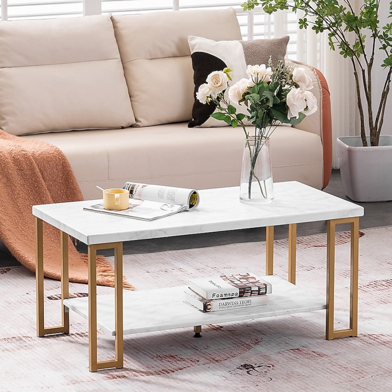 Glam Round Coffee Table featuring Gold Polished Criss Cross Base