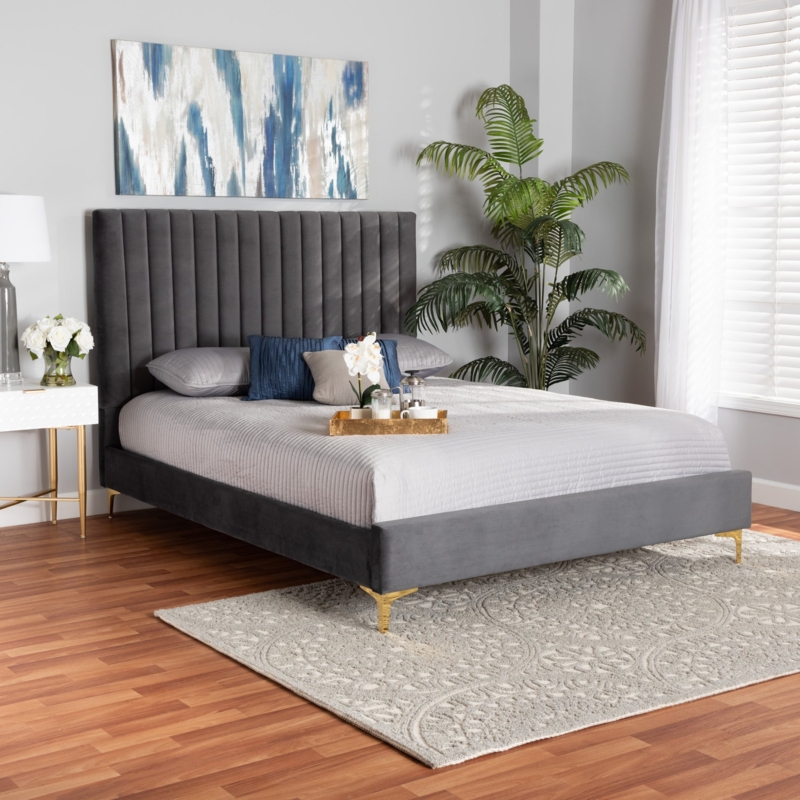 Grey Platform Bed With Curved Velvet Headboard And Gold Legs