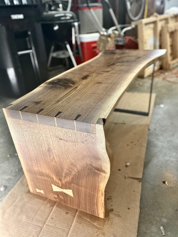 Handcrafted Coffee Table with Butterfly Inlays on Outdoor Deck