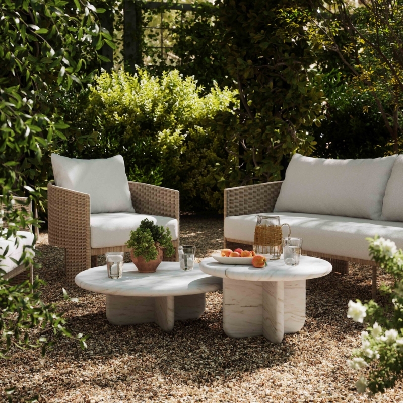 Indoor/Outdoor Round Coffee Table with Black Ribbed Pedestal Base