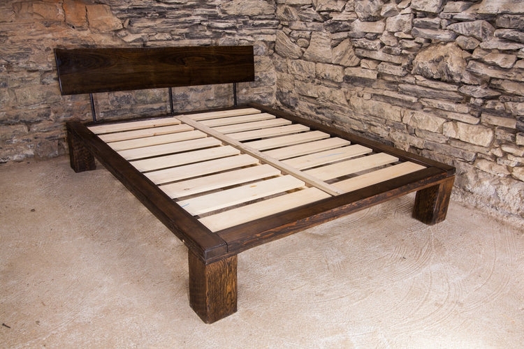 Low Profile Platform Bed with Pipe Frame Detail & Distressed Headboard