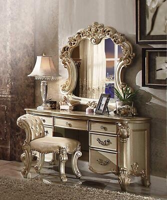 Ornate Vanity Table with Elaborate Carvings and Gold Patina Finish