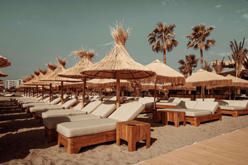 Outdoor Daybed Thatch Umbrella Terracotta Accents Low Profile Bohemian