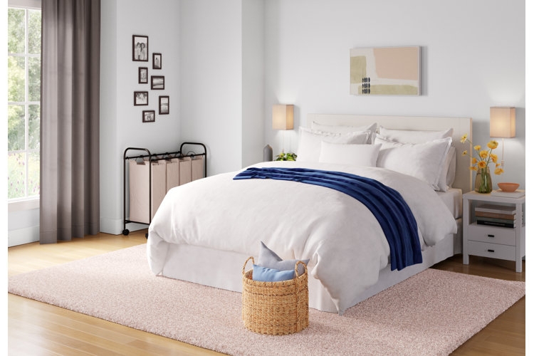 Platform Bed with Wood Toned Headboard and Terracotta Accents