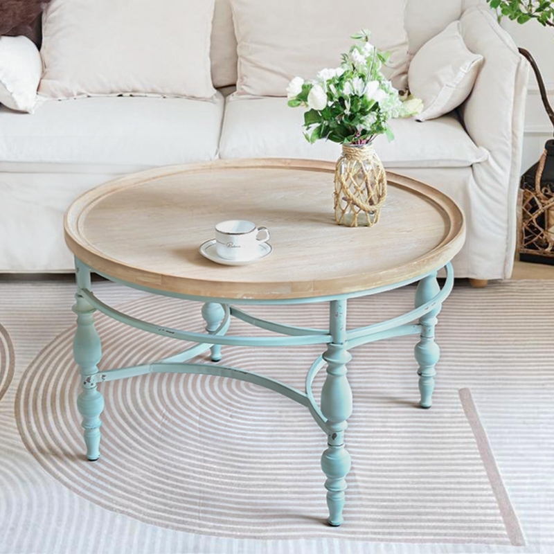 Round Coffee Table with Scrolled Metal Legs, Whitewashed Wood Top. Farmhouse living room.
