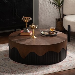 Round Pedestal Coffee Table featuring Handcrafted Global Relief Carving