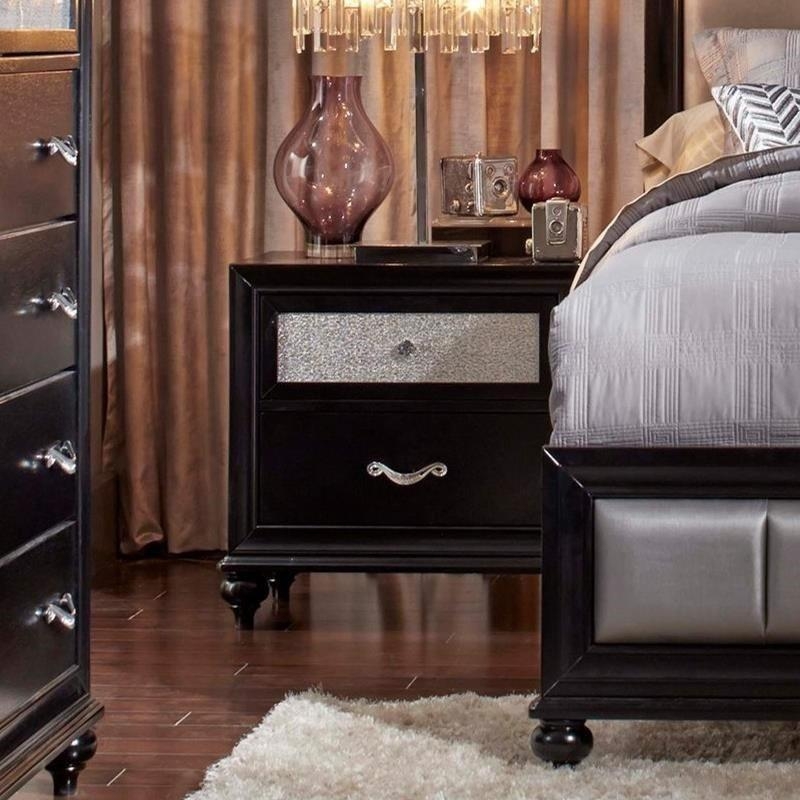 Sleek Black Nightstand with Horizontal Bar Pulls and Plinth Base