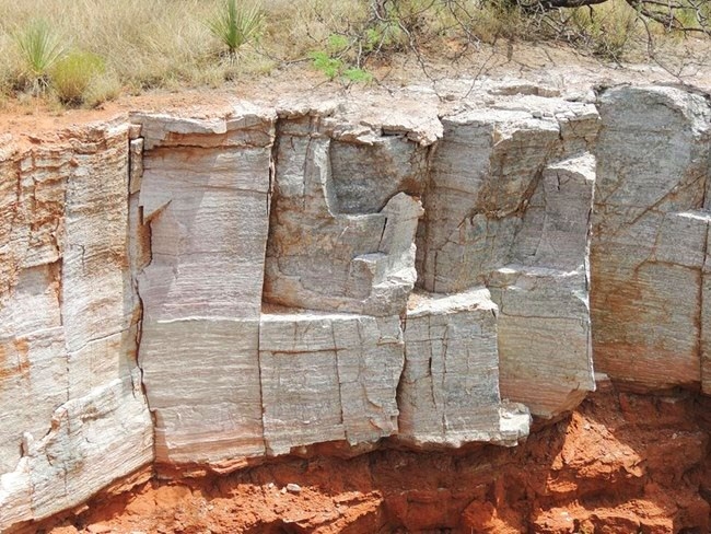 Stratified Terracotta and Cream Banded Earth Landscape