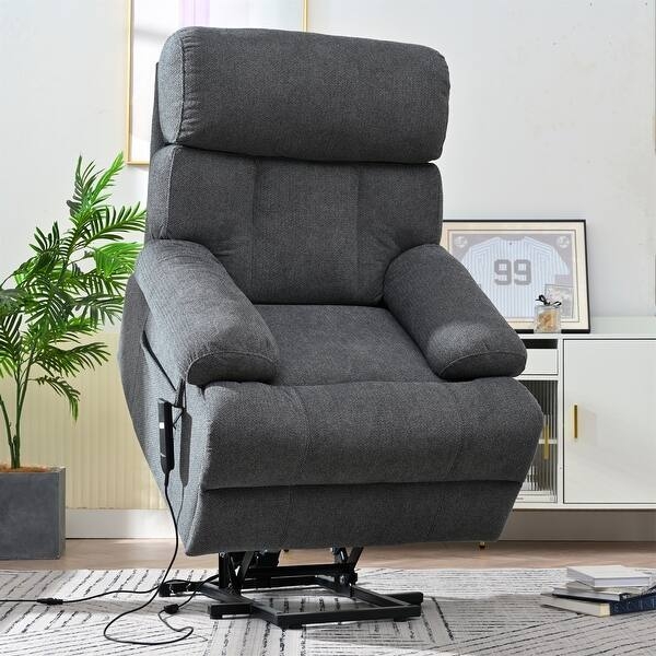 Tan Power Lift Recliner featuring Tufted Back and Cup Holders