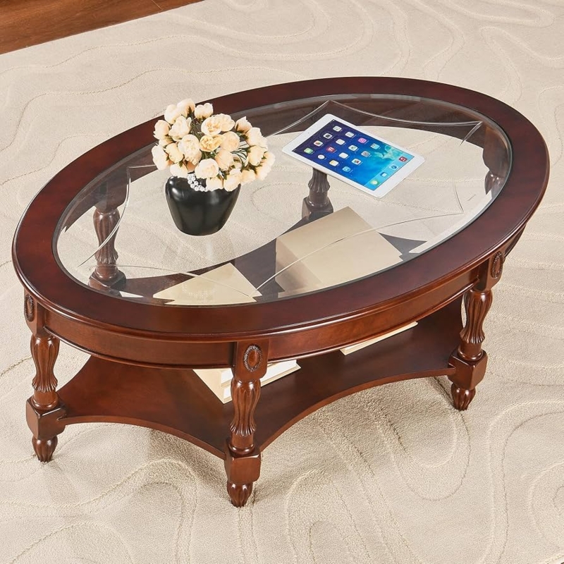 Traditional Oval Coffee Table with Glass Inset and Ornate Carved Legs