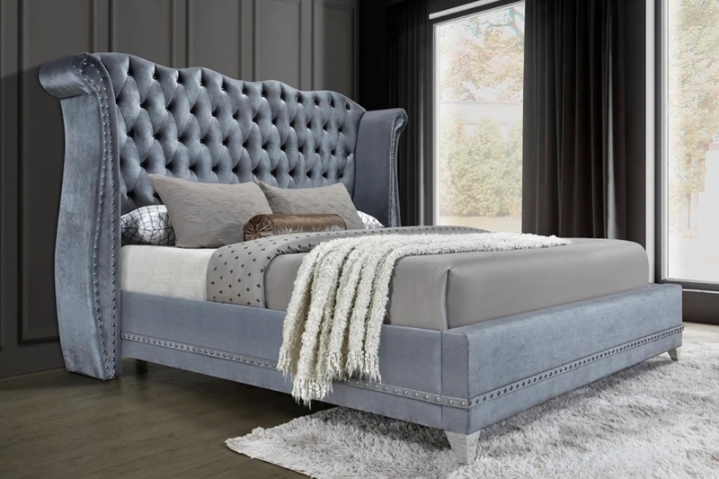 Upholstered Bed with Gold Metallic Trim and Winged Headboard