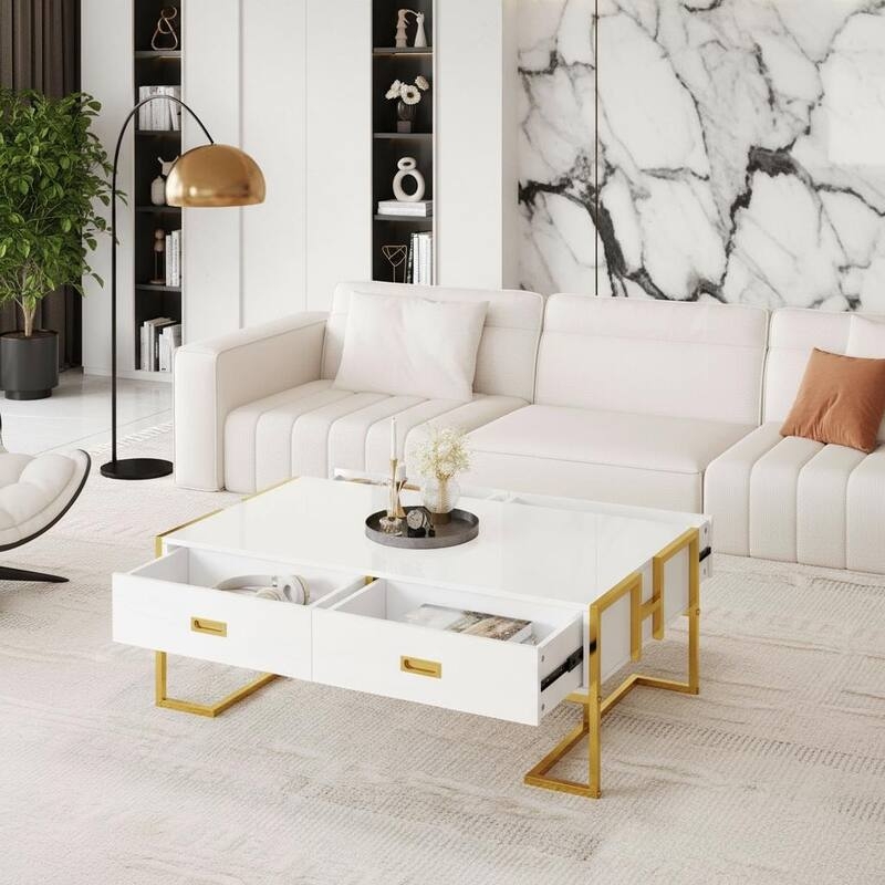 White Coffee Table with Fluted Panels and Gold Sled Base Storage