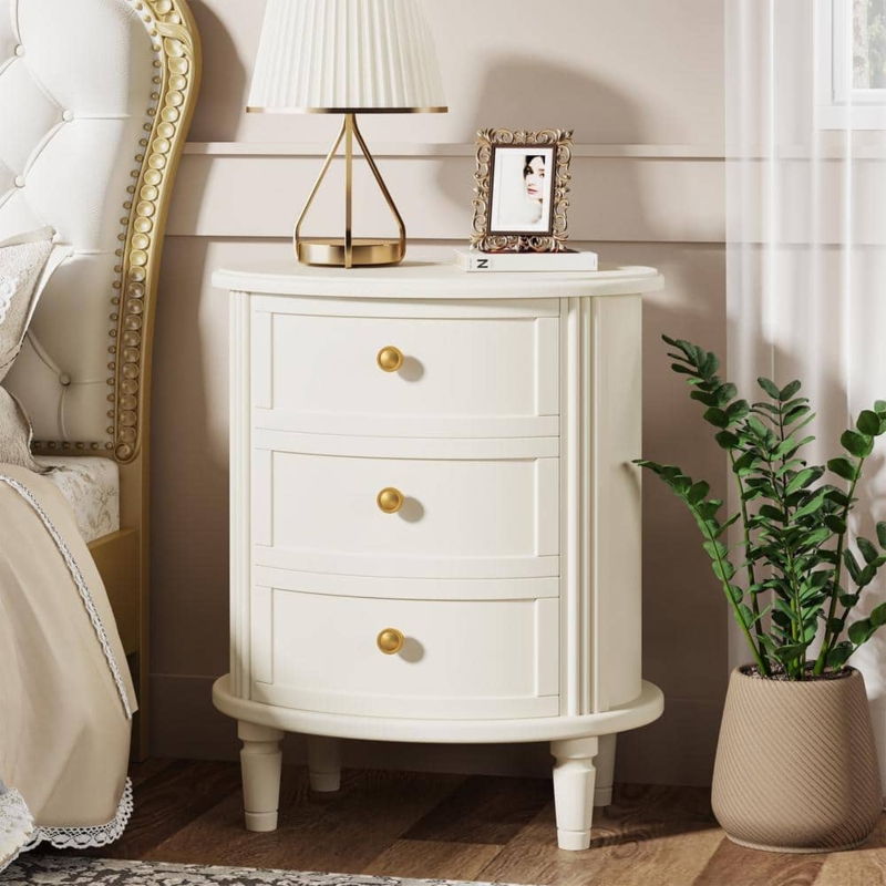 White Nightstand featuring Oval Silhouette, Three Drawers, and Gold Knobs
