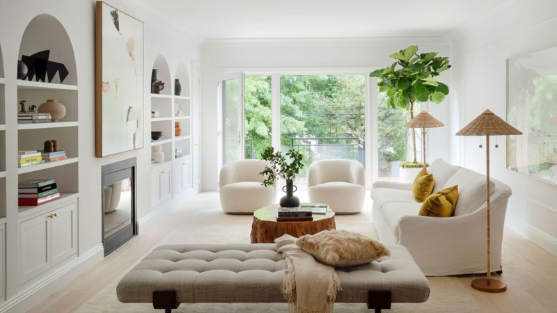Built-in Bookcases with Navy Blue Cabinetry surrounding Fireplace