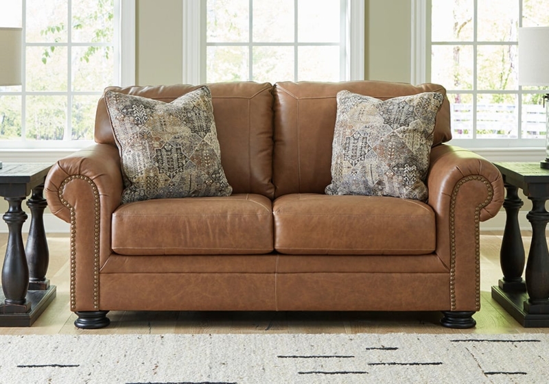 Caramel Loveseat with Plush Cushions and Geometric Pillows, Traditional