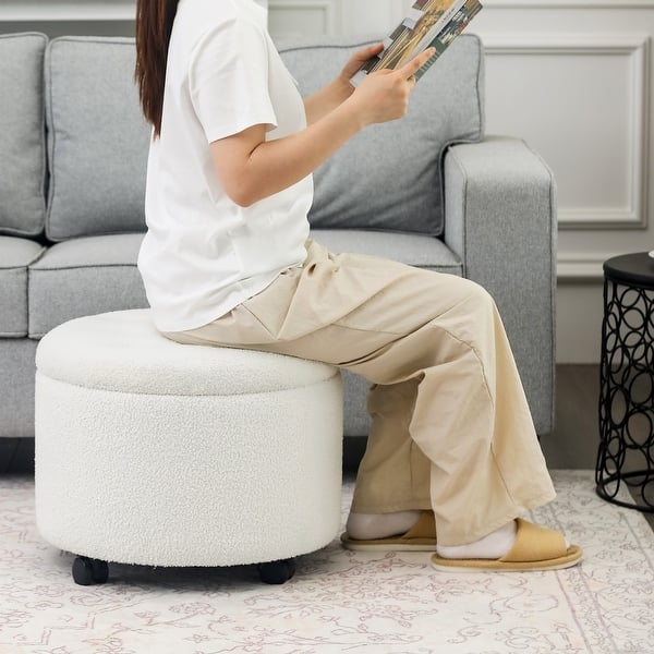 Charcoal Gray Storage Ottoman with Swivel Casters and Tufted Lid