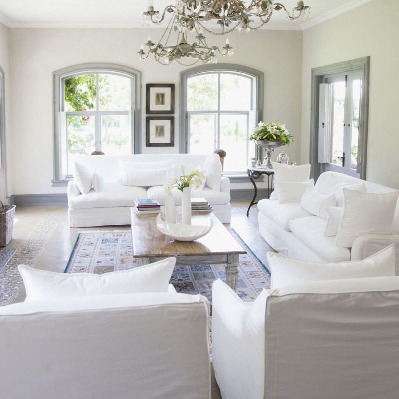 Coastal Style Sofa with Track Arms and Mixed Pattern Pillows