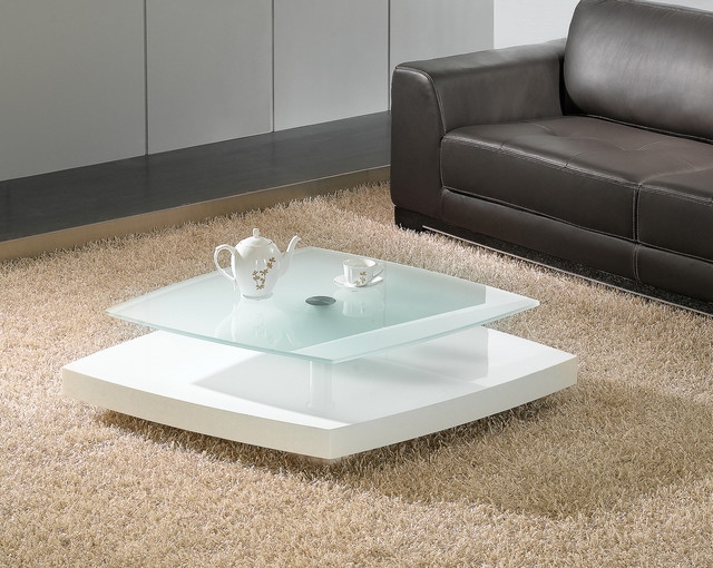 Coffee Table featuring Interlocking Design. Sculptural white coffee table.