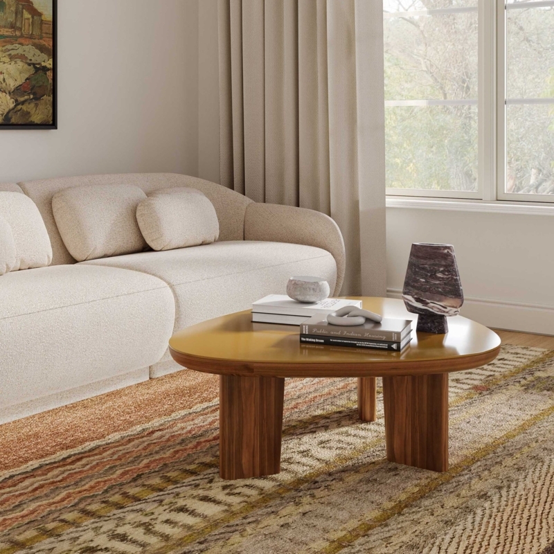 Coffee Table Featuring Open Frame Sculptural Base and Glass Top