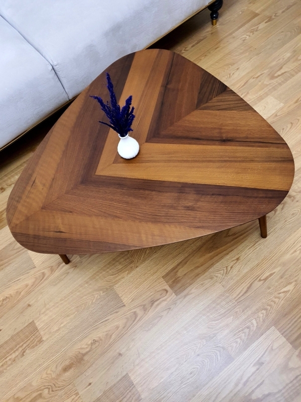 Coffee Table Featuring Splayed Tapered Legs and Plectrum Top