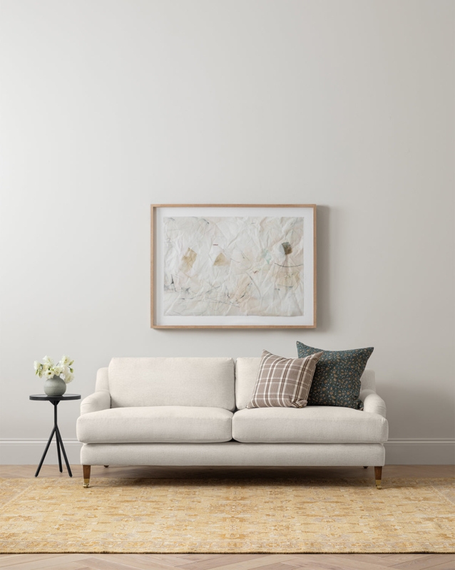 Cream English Roll Arm Sofa with Turned Legs and Brass Casters