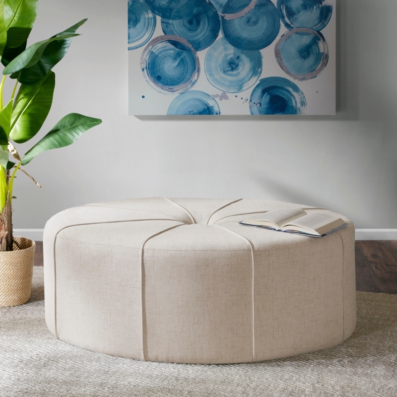 Cream Oval Ottoman Button Tufted with Bronze Nailhead Trim