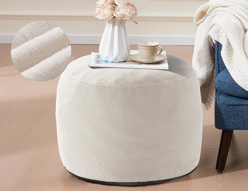 Cream Pouf Ottoman with Nubby Woven Texture and Piping Detail