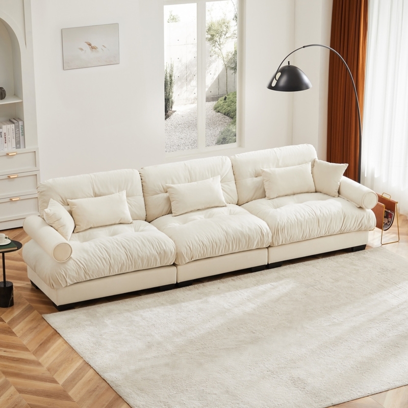 Cream Sofa with Bolstered Armrests in Minimalist Living Room