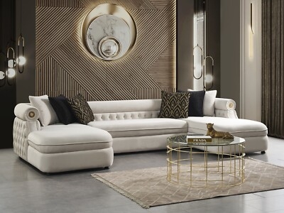 Cream U-Shaped Sectional Sofa with Gold Lion Head Accents and Tufting