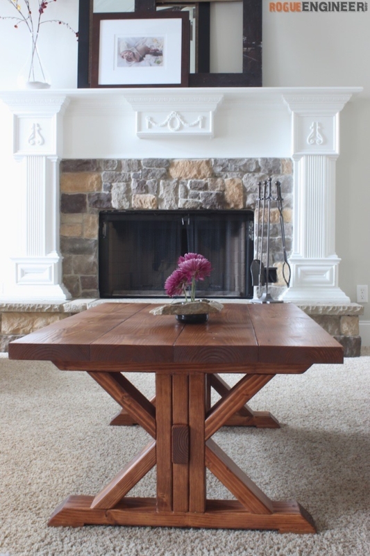 Dark Stained Wood Trestle Coffee Table with X-Frame Supports for Patio