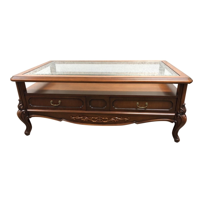 Glass Inlay Coffee Table featuring Ornate Carved Trestle Base