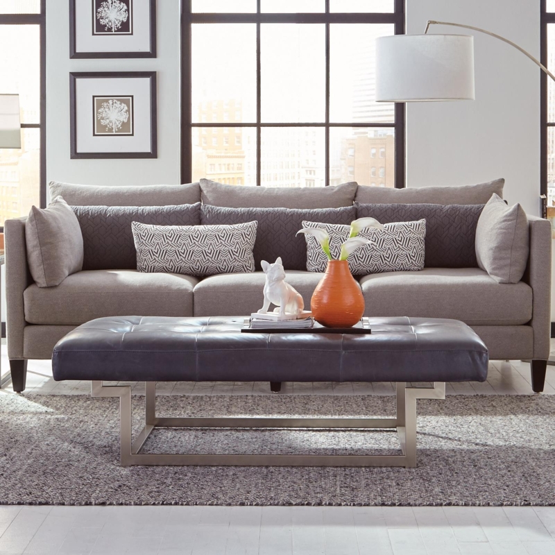 Grey Sofa with Tuxedo Arms and Geometric Accent Pillows