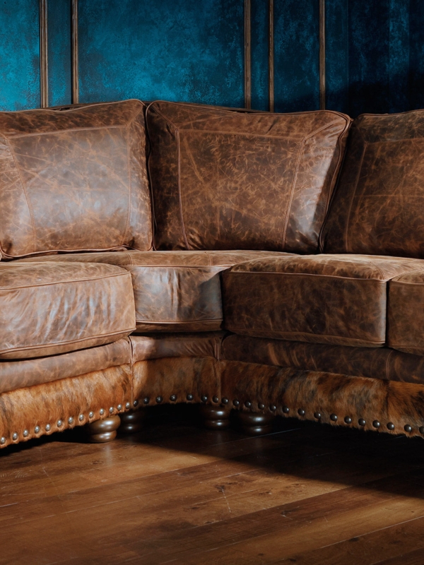 L-shaped Sectional Sofa with Hair-on-Hide Accents and Nailhead Trim