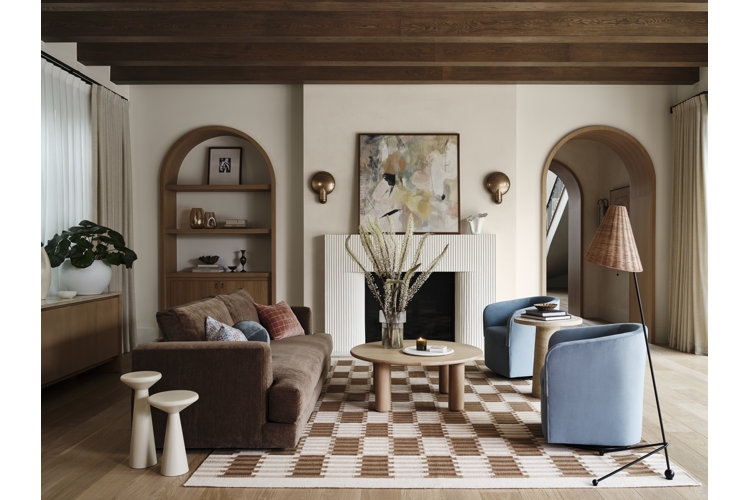 Large Cream Sectional Sofa With Abstract Wall Art and Arched Lamp