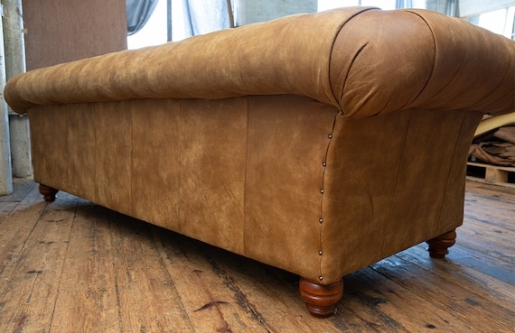 Large Four-Seater Chesterfield Sofa in Distressed Light Tan Finish