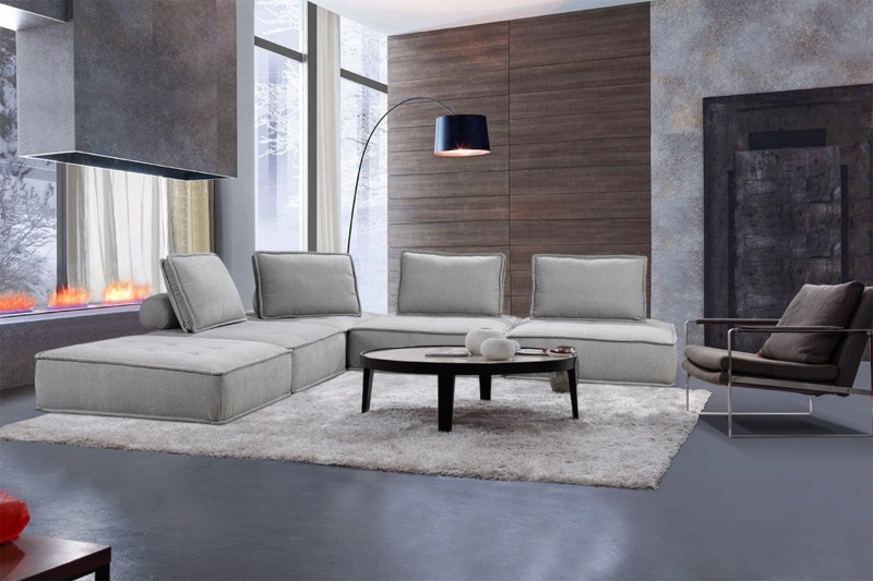 Low-Profile Modular Sectional Sofa with Deep Seating in Charcoal Grey.
