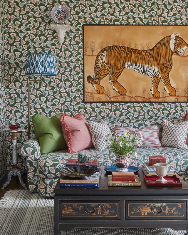 Maximalist Curved Sofa Matching Floral Wallpaper Design