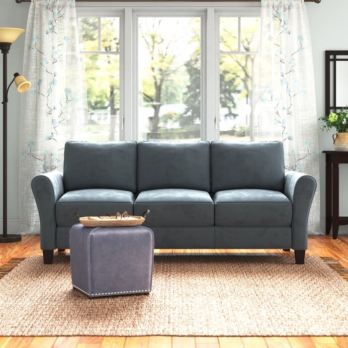Mid-Century Modern Grey Sofa Featuring Tapered Wooden Legs