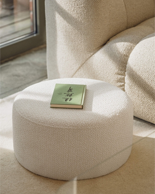 Minimalist Beige Boucle Pouf with Low Round Silhouette