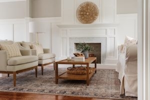 Minimalist Coffee Table with Tapered Legs and Lower Shelf, Light Finish