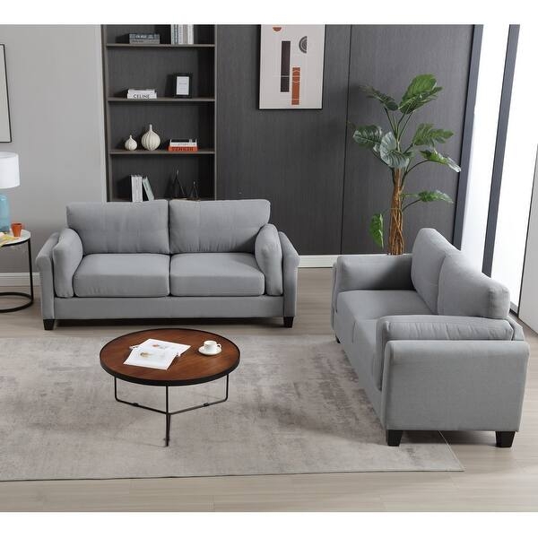 Minimalist Sofa Set with Splayed Black Legs in Charcoal Woven Fabric.